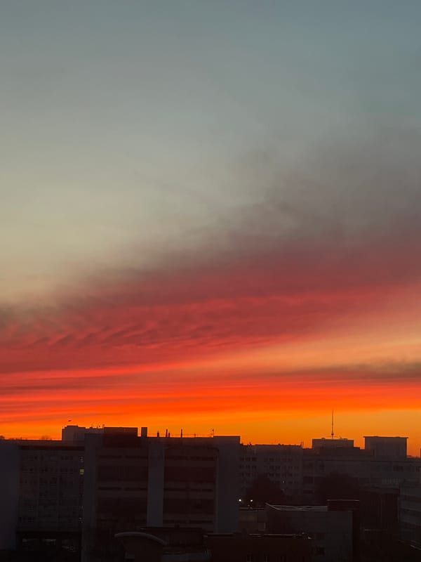 Vivid sunset documented across Izhevsk skyline by multiple witnesses
