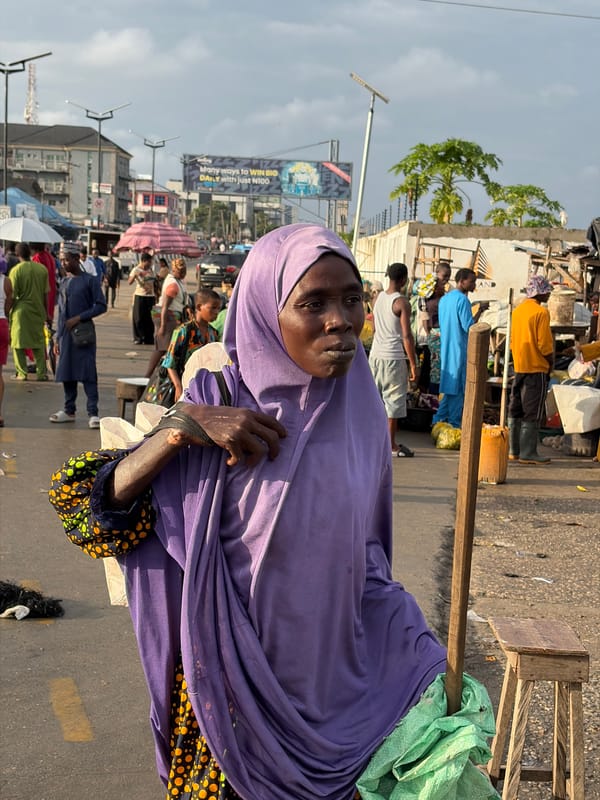 Morning street activity in Igboefon, Lagos — market and delivery scenes