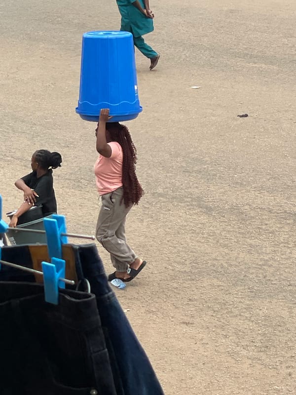 Daily street life unfolds in Bukuru Nigeria marketplace