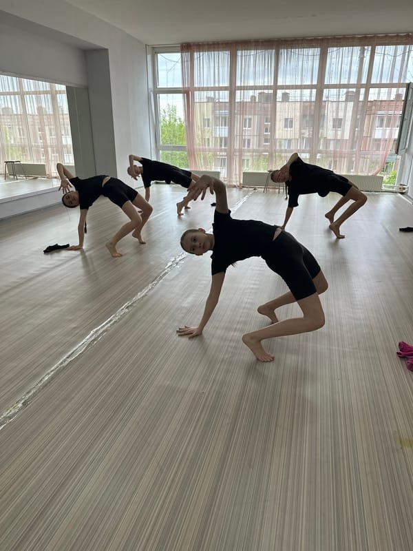Young dancers practice gymnastic poses in Votkinsk studio