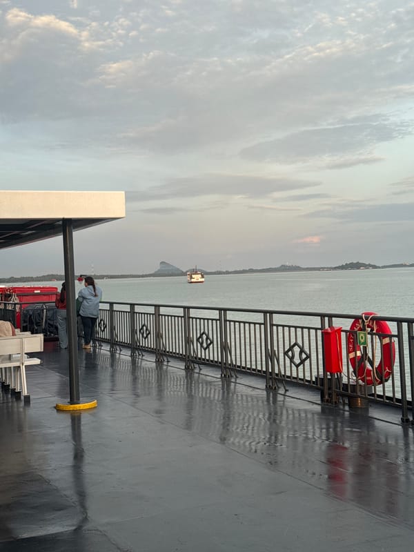 Dusk ferry views at Don Sak, islands on the horizon