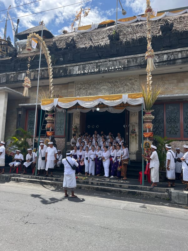 Community gathering at traditional Balinese hall in North Kuta