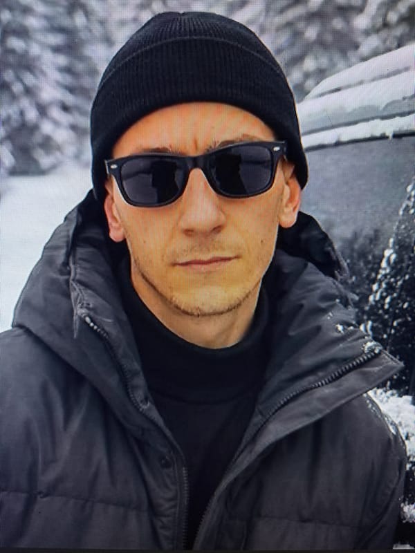 Winter gear, wet streets, and a VPN app in Kemerovo