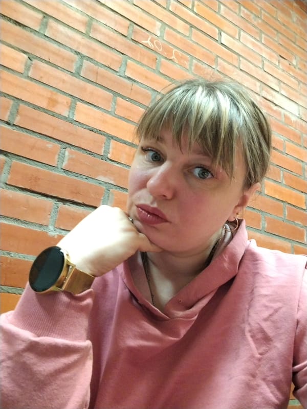 Woman takes selfies in Шебунино, Russia evening