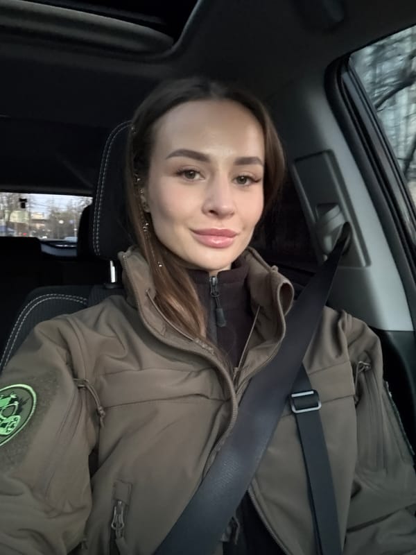 Woman in patched jacket observed driving in Kyiv