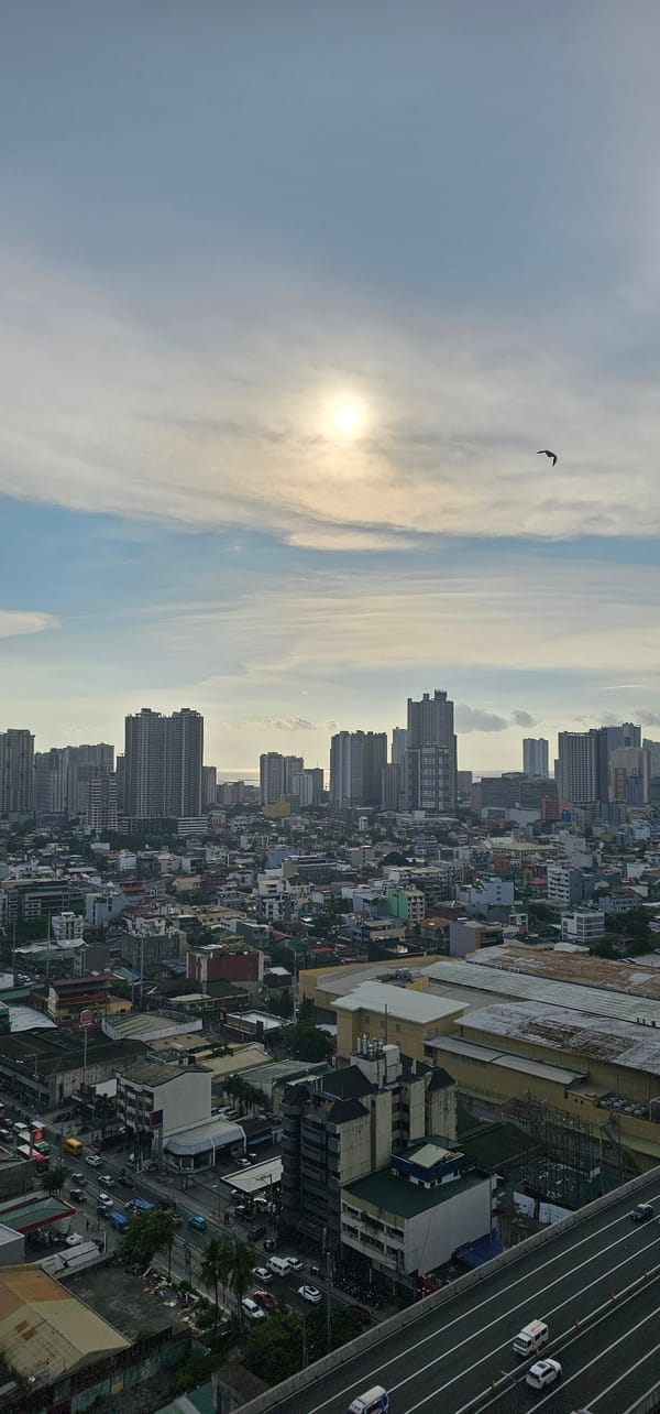 Makati skyline and elevated highway under morning overcast skies