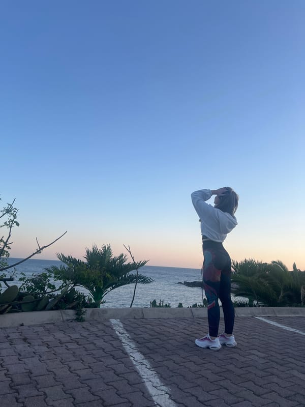 Woman captures coastal sunset memories in Montenegro seaside town