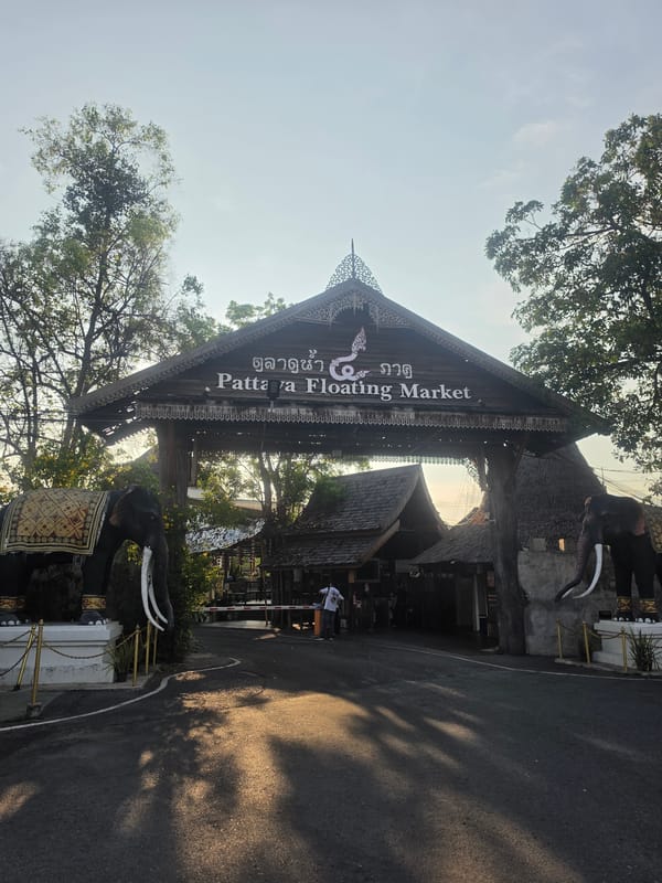 Tourist documents Pattaya Floating Market entrance and decorative features