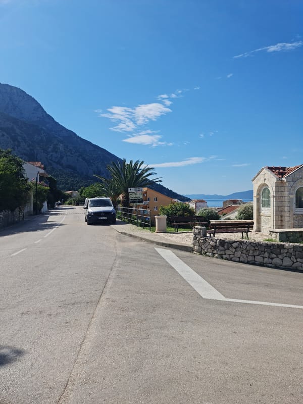 Summer morning street life in coastal Gradac, Croatia