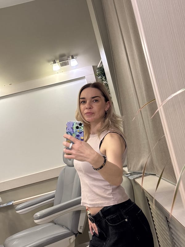 Woman takes selfies in dental clinic in Vsevolozhsk