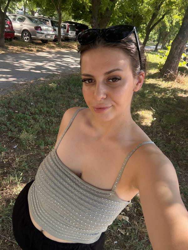 Afternoon selfie session around Plovdiv streets and a parked car.