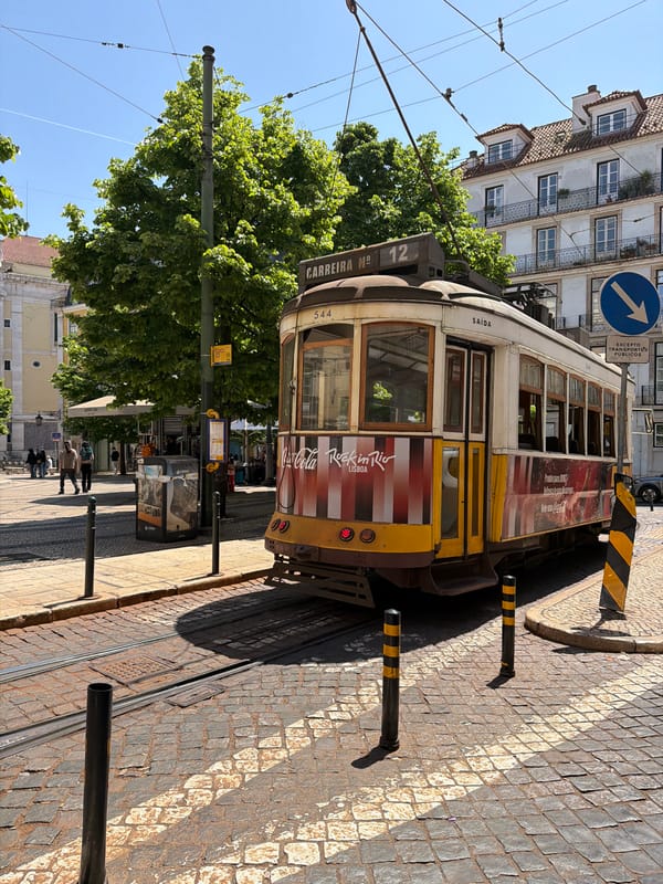 Vintage Lisbon tram displays Rock in Rio advertising