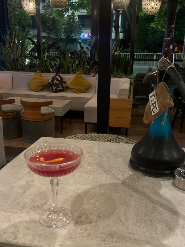Red cocktail photographed at outdoor venue in Burgas, Bulgaria