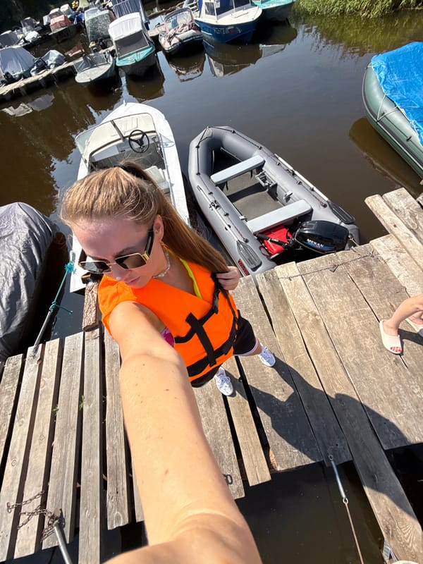 Summer boating day at a Chaikovsky river marina