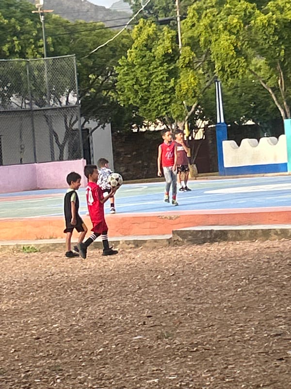 Evening street and park life in Santa Ana, Venezuela