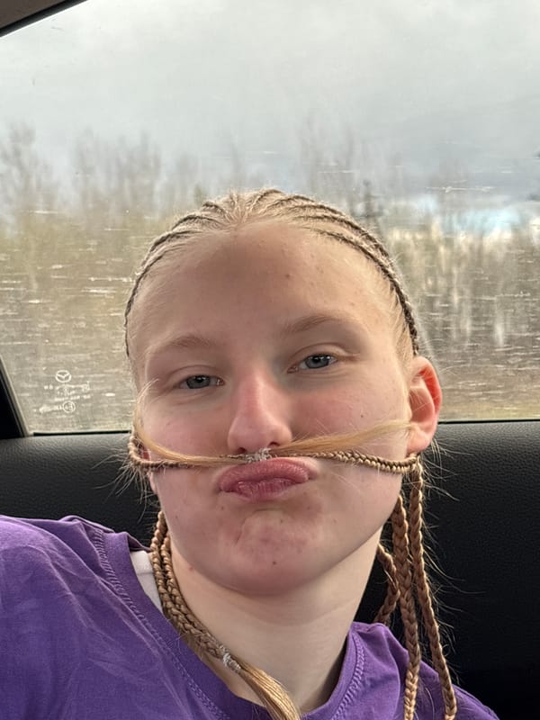 Young person photographed in car in Malaya Purga, Russia
