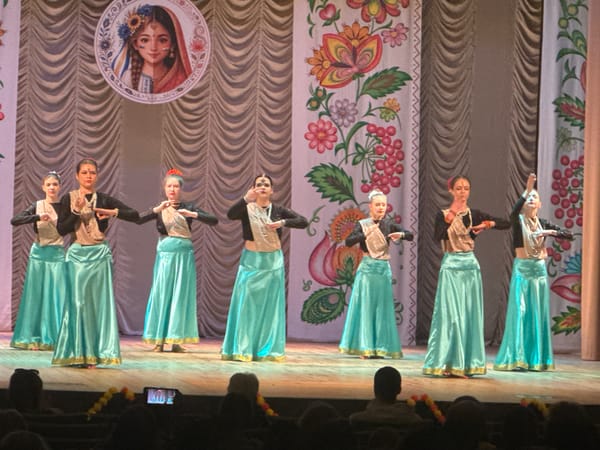 Traditional Indian-Ukrainian cultural dance performance held in ornate theater