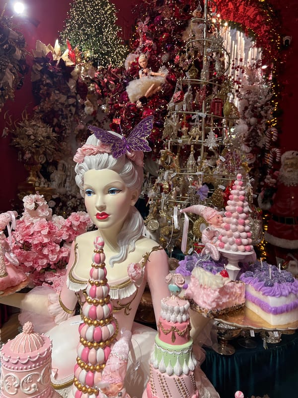 Marie Antoinette mannequin displayed among sweets in Budapest shop