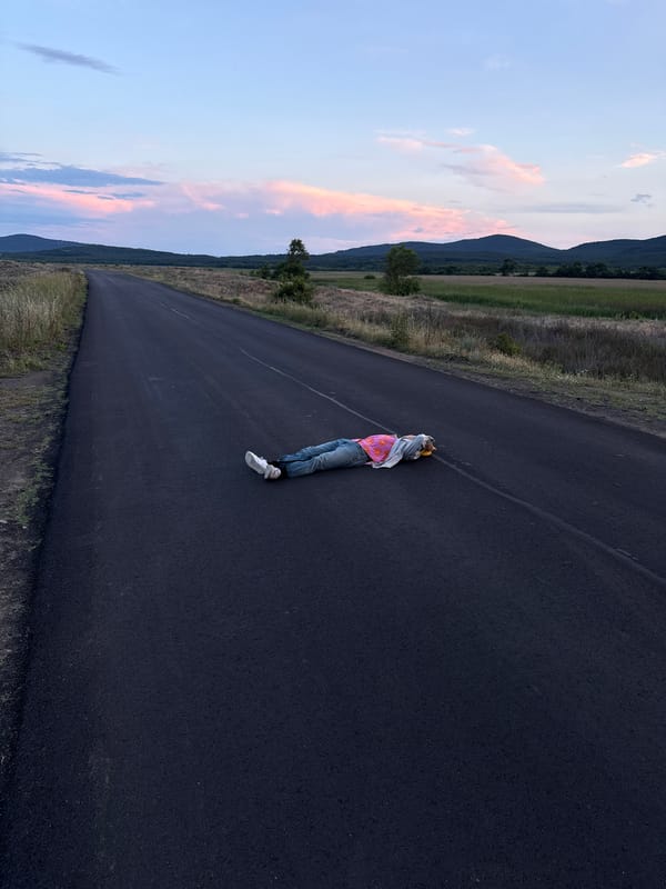 Person photographed lying on roads, beachcombing near Sozopol, Bulgaria