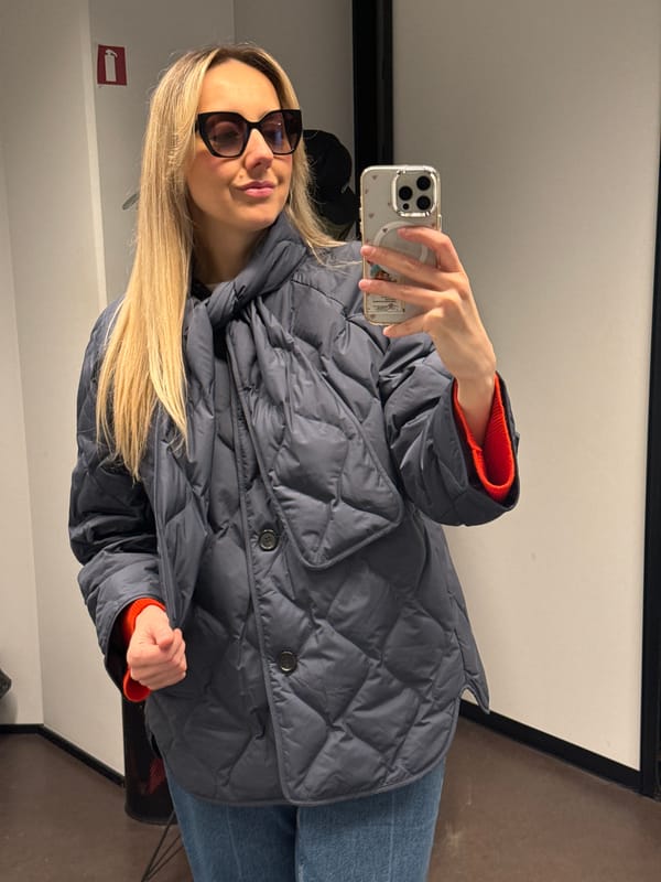 Woman takes selfie in fitting room in Riga