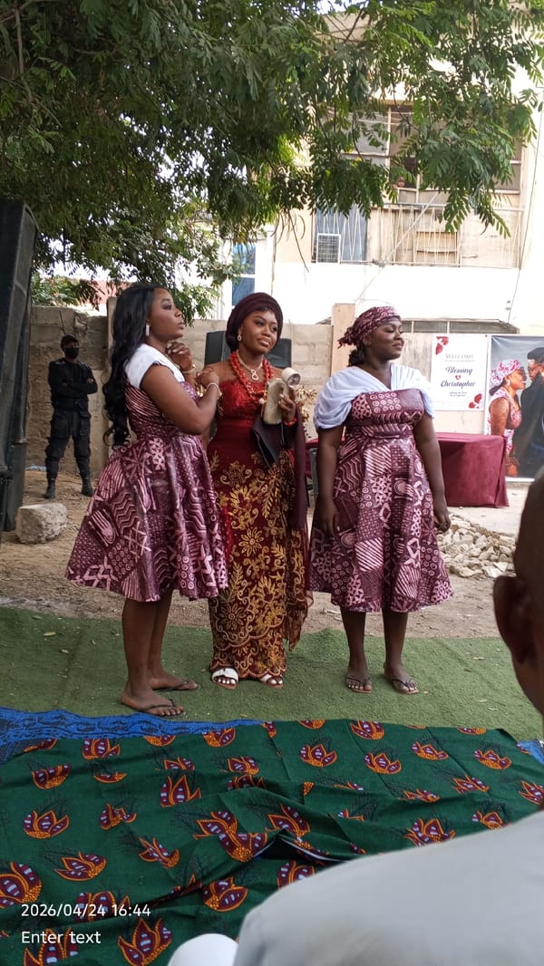 Traditional African wedding celebration captured under outdoor canopies