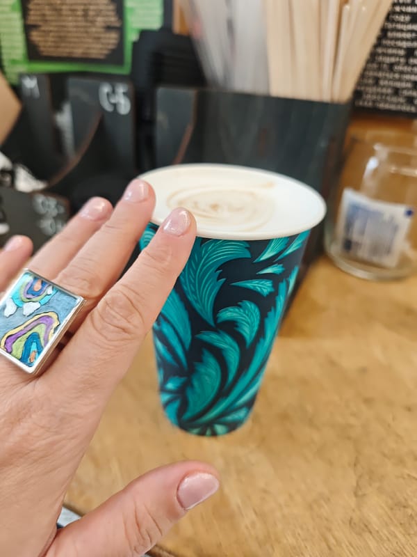 Coffee break at Moscow subway station, distinctive jewelry spotted
