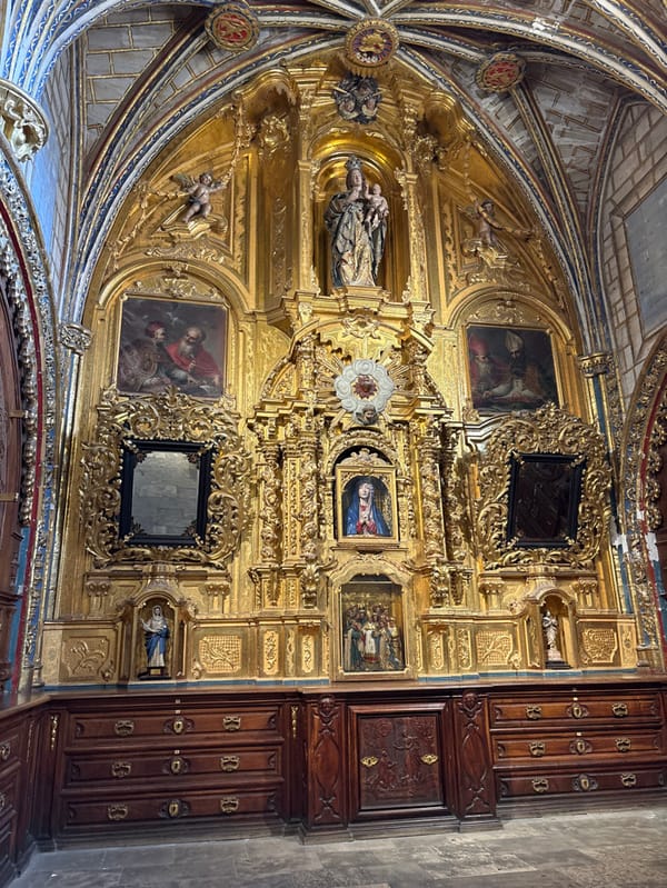 Witness documents Cuenca Cathedral and historic plaza during rainy afternoon