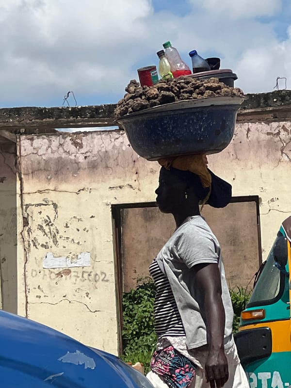 Goods balanced overhead on the streets of Jos, Nigeria