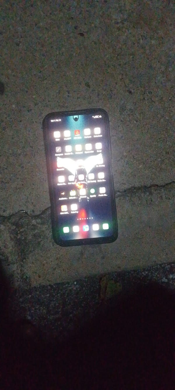 Late-night walkthrough of a Jalingo building and its surroundings