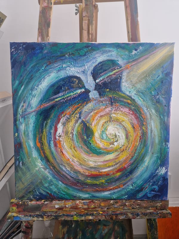 Abstract painting with colorful swirling patterns spotted on easel