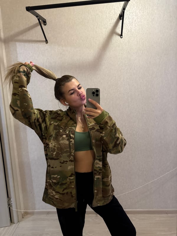 Woman documents casual afternoon with selfies and beverages in Chaikovsky