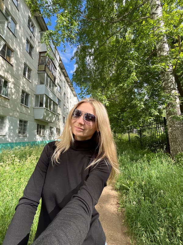 Person takes playful selfies with Yorkshire Terrier in Chaikovsky