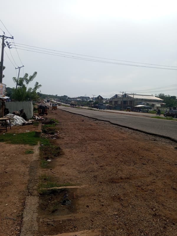 Daily life unfolds across streets and eateries in Lokoja