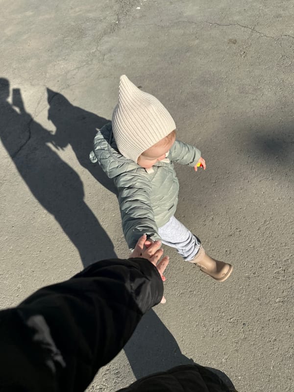 Child and cat captured in everyday Yekaterinburg morning moments