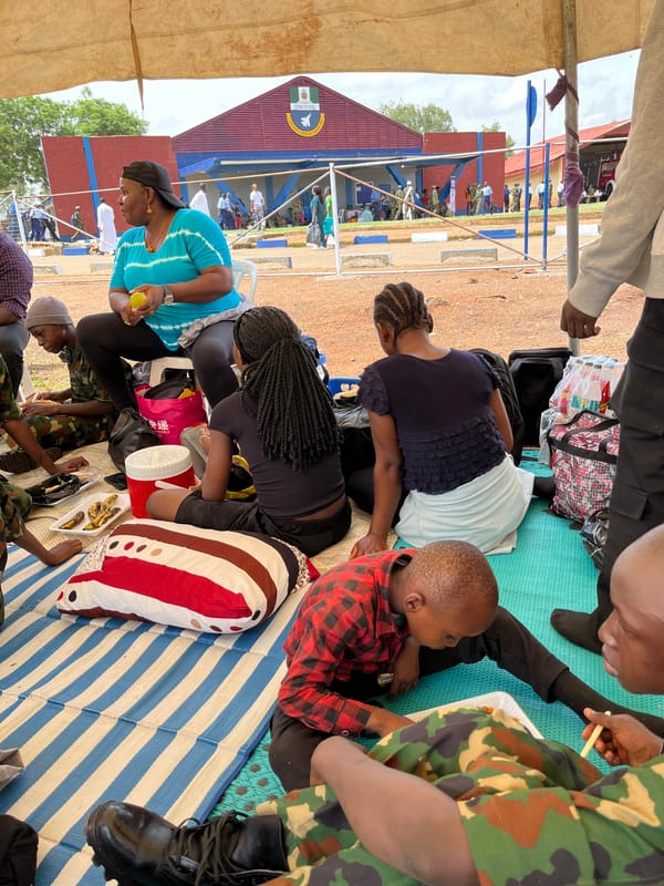 Outdoor community gathering with food in Bar Jirgi Summa