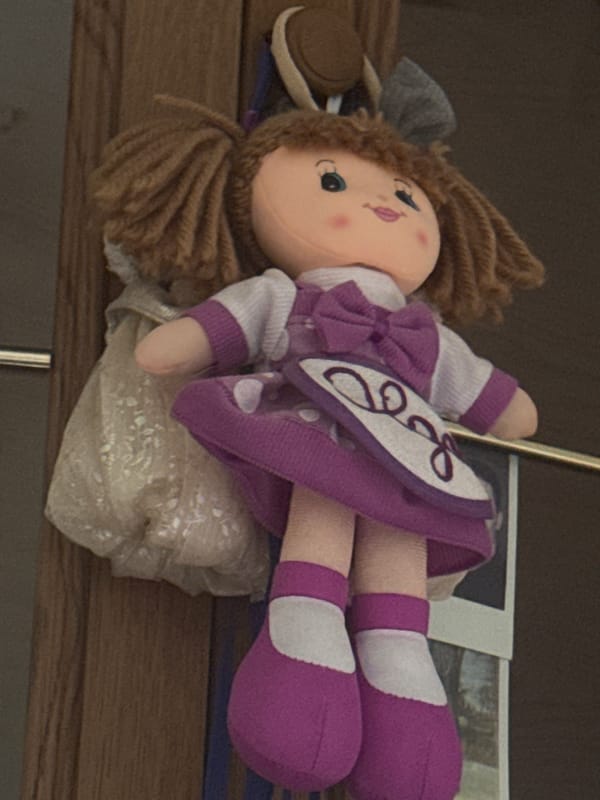 Handmade dolls on display in a Strakonice interior