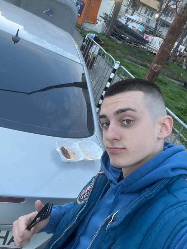 Man photographed with silver car in Burgas, Bulgaria