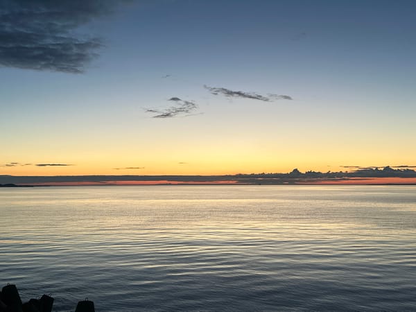 Sunset stroll along Tallinn's waterfront promenade and harbor