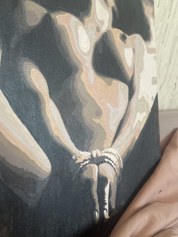 Artist documents paint-by-numbers nude figure paintings in progress, Russia