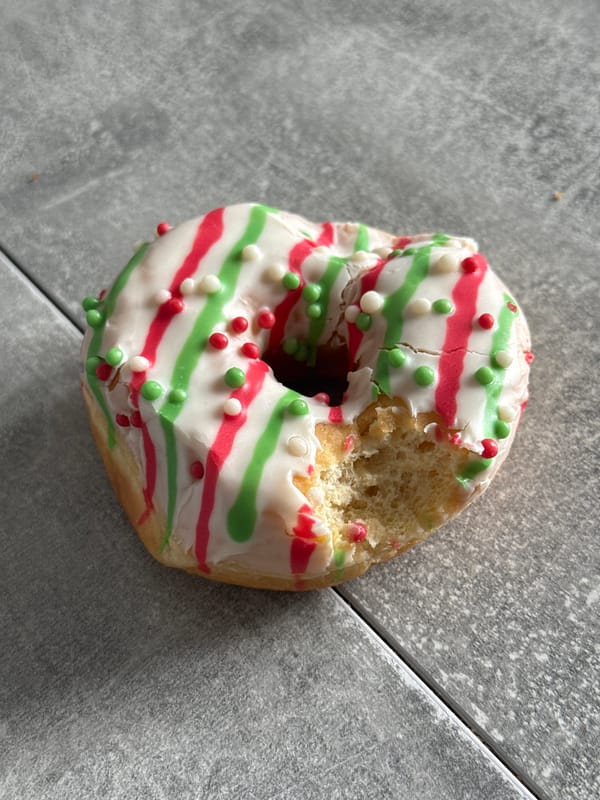 Decorated donut spotted on tiled surface in Lyubertsy