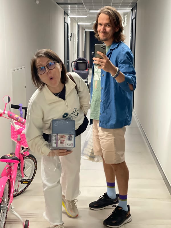 Couple spends morning shopping, trying on clothes at retail store