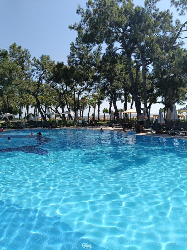 Sunny resort pool day in Kemer, Turkey