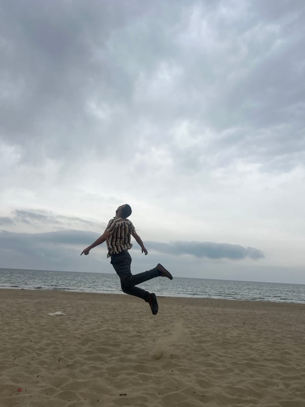 Beach visitor enjoys overcast morning at Martil Morocco coastline