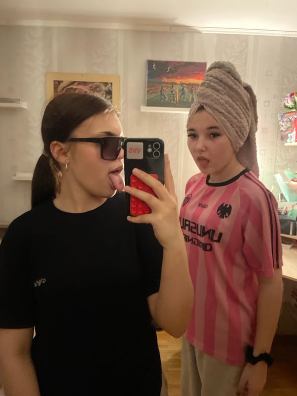 Two women take mirror selfie in Vsevolozhsk, Russia