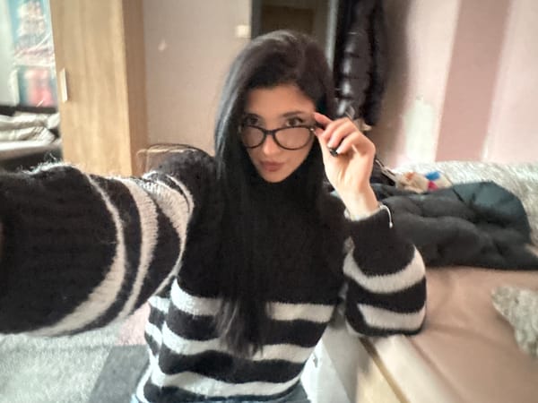 Woman takes selfies at home in Sofia apartment