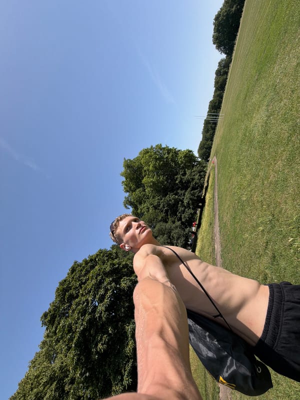 Sunbathing on the grass in London on a clear day