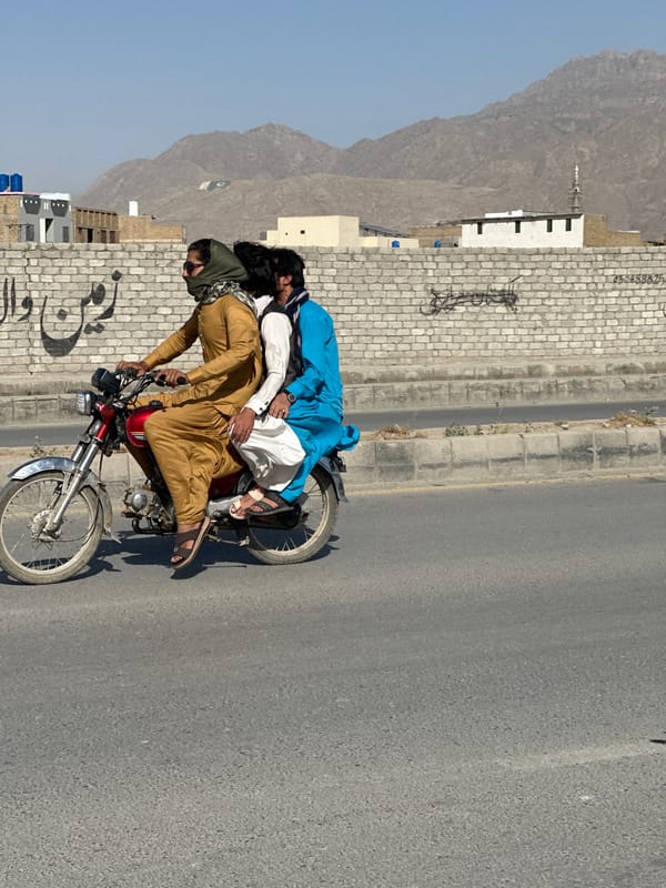 Three people spotted on red motorcycle in Quetta