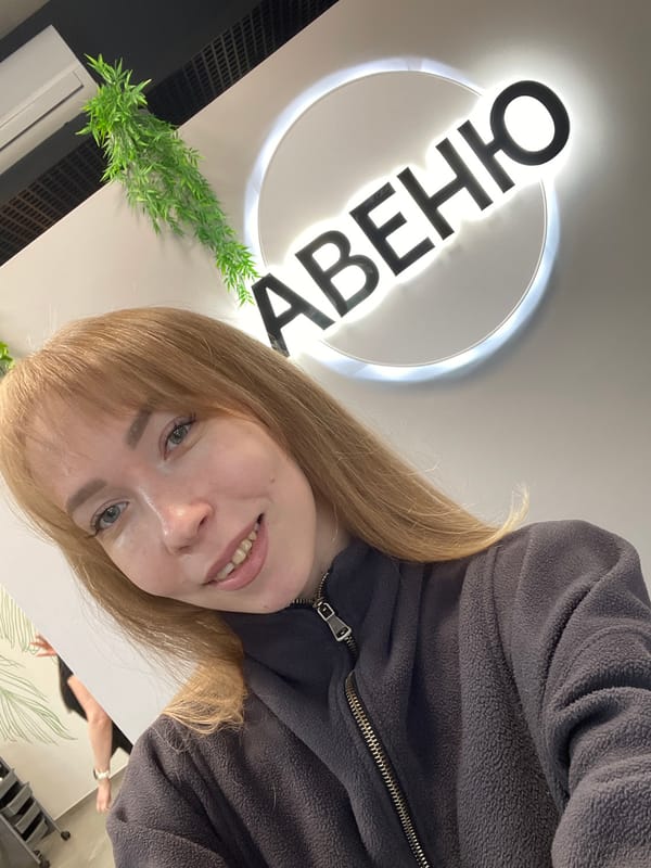 Woman takes selfies at hair salon in Perm, Russia