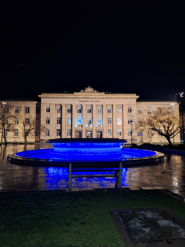 Nighttime photography captures illuminated civic landmarks in Ruse, Bulgaria