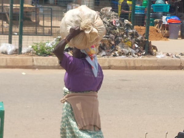 Street market vendors and shoppers documented during morning hours